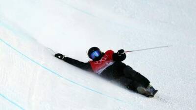 Winter Olympics: China's Eileen Gu wins halfpipe final as GB's Zoe Atkin ends ninth