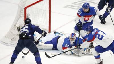 Ice hockey-Finland beat Slovakia to reach gold medal final
