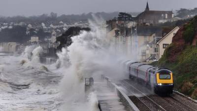 UK storm: Rare ‘red’ warning for wind affects rail, road and air travel