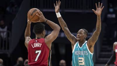 Kyle Lowry, Heat battle back to beat Hornets in double OT