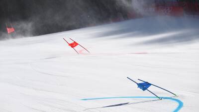 Winter Olympics 2022 - High winds delay start of mixed team parallel finals with gates cut to improve conditions