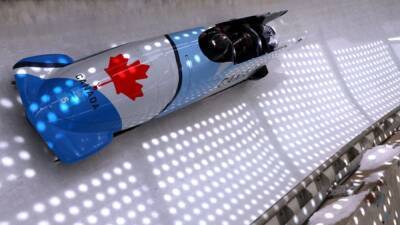 Bobsleigh-Canada's Kripps keeps the four-man a three-bob race as Germany leads at halfway - channelnewsasia.com - Germany - Canada - China - Beijing