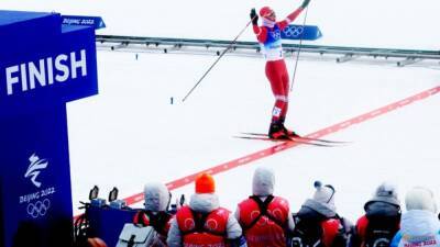 Cross-country skiing-Russian Bolshunov wins men's mass start race
