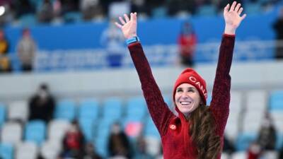 Olympic wake-up call: Ivanie Blondin gives Steve Armitage one final Canadian medal call