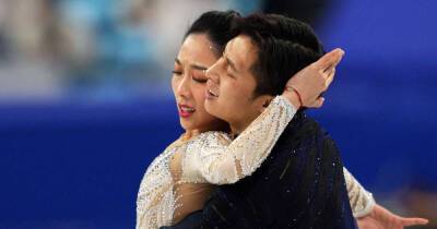 Olympics-Figure skating-Chinese pair banish fraught Games with home gold