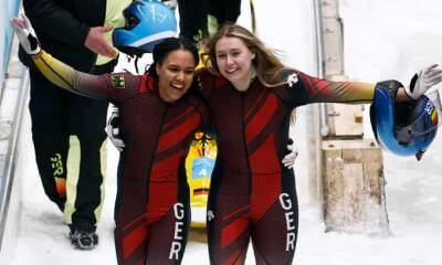 Germany’s women slide to Winter Olympics glory with bobsleigh one-two
