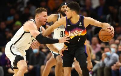 Devin Booker - Chris Paul - Cam Johnson - Rui Hachimura - Suns cruise to 11th straight win, Giannis' triple-double powers Bucks - beinsports.com - Washington -  San Antonio - county Bucks -  Washington