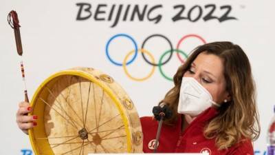 Canada's chef de mission Catriona Le May Doan presented First Nations drum to bang in Beijing