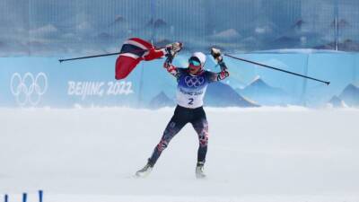 Cross-country skiing-Johaug dominates women's 30km to win Norway's 16th gold