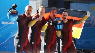 Winter Olympics 2022 - Francesco Friedrich guides German four-man crew to victory to repeat double gold medal feat