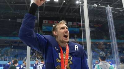 Ice hockey-Finland's Anttila completes rough journey to Beijing gold