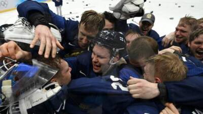Winter Olympics: Finland win first ice hockey gold with victory over Russian Olympic Committee