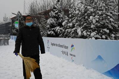 China celebrates record Winter Olympics haul and beating US