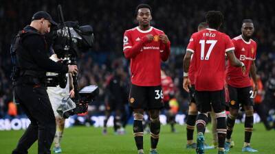 Subs strike late to fire Manchester United past battling Leeds
