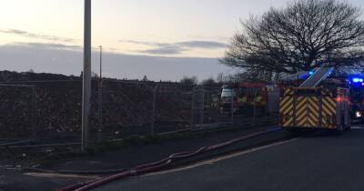 LIVE Emergency services scrambled as building fire forces major road to close - updates