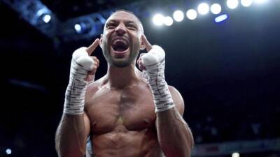 Brook reigns over Khan in sixth-round TKO