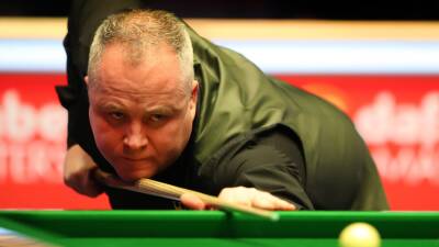 European Masters 2022: John Higgins coasts into last-64 after beating Jamie Rhys Clarke