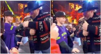 Brock Lesnar breaks character during WWE Raw to interact with young fan