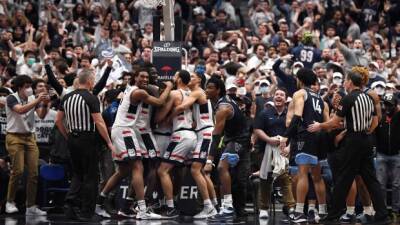 Cole rallies No. 21 UConn past No. 8 Villanova late