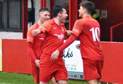 Hythe Town player-manager James Rogers insists his team are still not clear of the Isthmian South East relegation places just yet