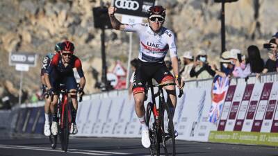 Tadej Pogacar storms to stage-four victory to take overall lead in the UAE Tour