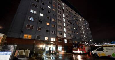 Firefighters tackle blaze at tower block in Tameside
