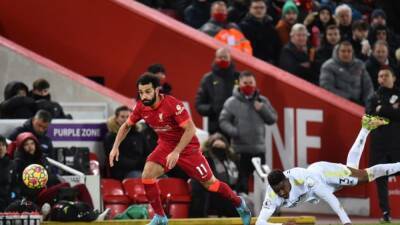 Liverpool hit Leeds for six to close gap on Man City
