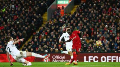 Liverpool hit Leeds for six to narrow the gap on City