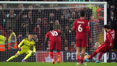 Liverpool put pressure on leaders Manchester City after easing past Leeds