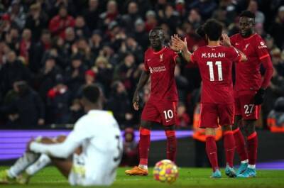 Liverpool put six past Leeds to cut Man City's lead, Spurs stunned by Burnley