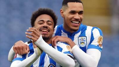 Huddersfield hit late double to beat Cardiff and boost promotion hopes
