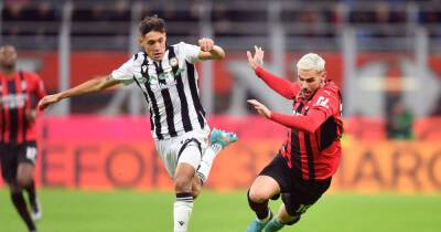 Soccer-Milan held at home by Udinese to leave door open for Inter