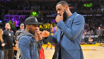 Sources -- LeBron James' agent meets with Los Angeles Lakers, denies any push to shake up front office