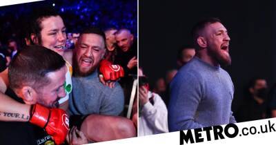 Conor McGregor helps carry injured Sinead Kavanagh backstage after showing up to support teammates at Bellator 275