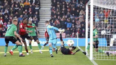 Jamal Lowe nets dramatic winner as Bournemouth late show stuns 10-man Stoke