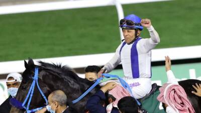 Horse racing-Longshot Emblem Road claims shock win in Saudi Cup