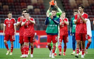 Under pressure, FIFA moves Russia home games and bans flag and anthem