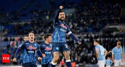 Napoli edge Lazio to level AC Milan at top of Serie A, AS Roma beat Spezia