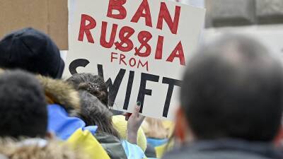 Ukraine war: What does banning 'selected' Russian banks from SWIFT mean?