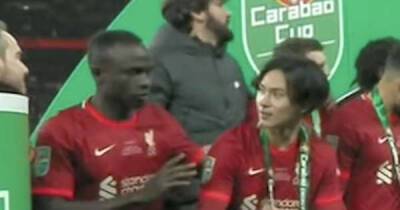 Sadio Mane asked Minamino to not spray champagne during celebrations - so he put bottle down
