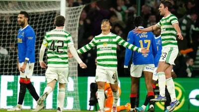 Reo Hatate stars as Celtic beat Old Firm rivals Rangers to go top of the table