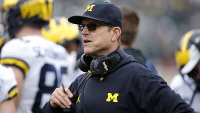Jim Harbaugh says he'll stay at Michigan after Vikings interview