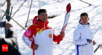 'Shameful', says US lawmaker on China picking PLA soldier as torchbearer for Beijing Olympics - timesofindia.indiatimes.com - Usa - China - Beijing - India - county Valley