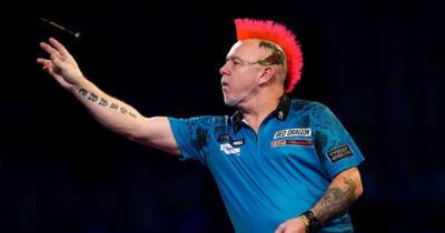 Peter Wright triumphs on opening night of revamped Premier League in Cardiff