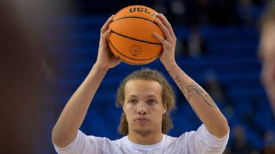 UCLA Bruins' Mac Etienne arrested after appearing to spit at Arizona fans - espn.com - state Arizona