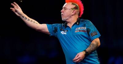 Peter Wright triumphs on opening night of revamped Premier League in Cardiff