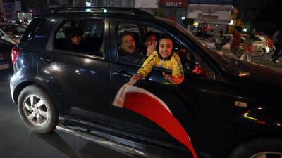 Fans celebrate Egypt's Afcon semi-final win in Cairo - in pictures