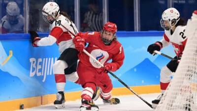 Short-handed Russian women's hockey team exits isolation, upends Switzerland - cbc.ca - Russia - Switzerland - Usa - Canada - Beijing