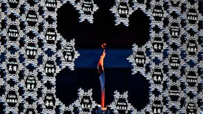 2022 Beijing Winter Olympics kicks off with a 'simple' show and a message of 'One World, One Family' - abc.net.au - China - Beijing