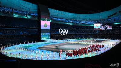Beijing Winter Olympics opens with glittering ceremony